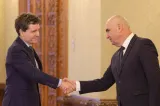 Oamenii lui Bolojan, formați la Berlin. Legături neștiute